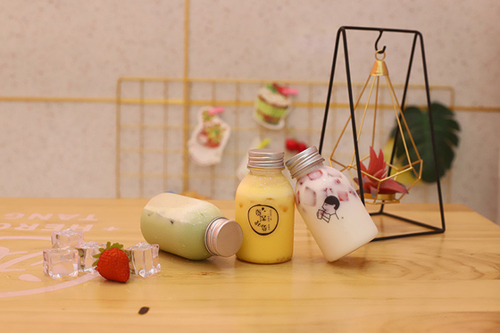 Malzeme ve verimlilikle içmek için saplı plastik süt çayı şişeleri