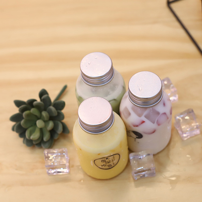 Malzeme ve verimlilikle içmek için saplı plastik süt çayı şişeleri