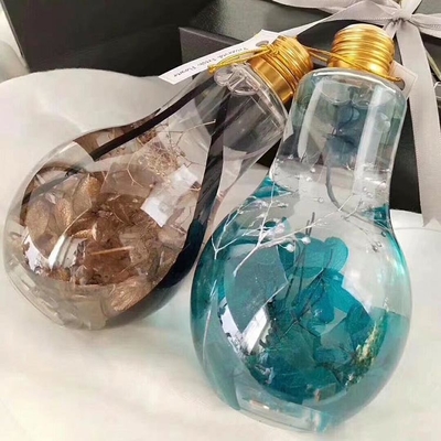 Sıcak Satış Meyve suyu cam kavanozu Kapaklı 100ml Mini Boyutlu Güzel Işık ampul şeklinde PET plastik şişe