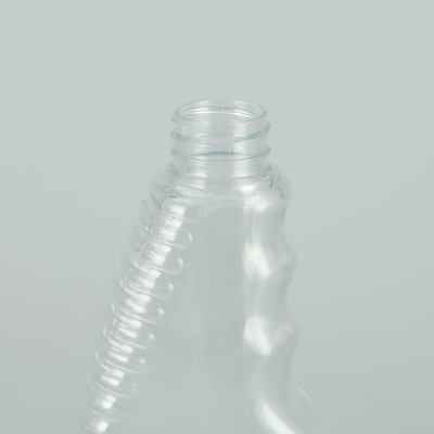 Yumuşak yuvarlak PET plastik sprey şişesi klasik tasarımlı şeffaf renkte.